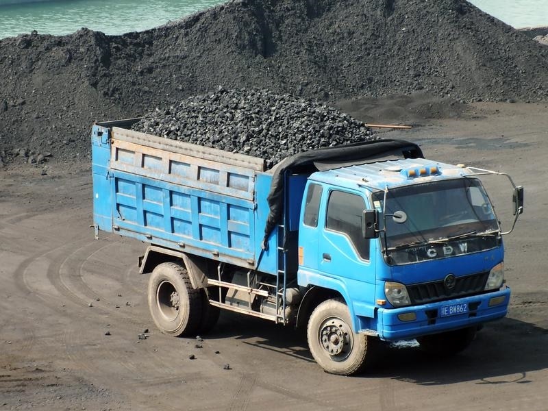 A truck carries coal at Yichang Port in central China.