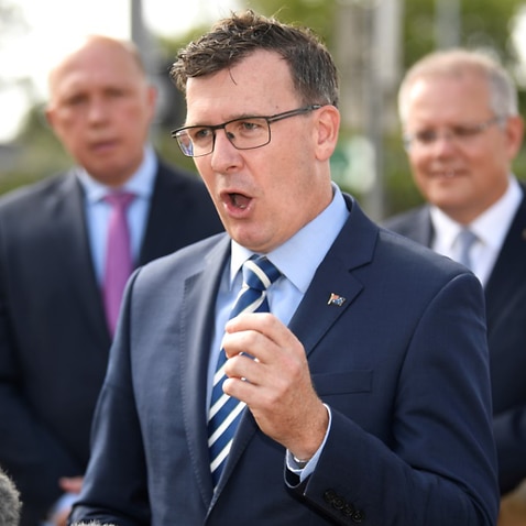Acting Immigration Minister Alan Tudge speaks as Minister for Home Affairs Peter Dutton and Australian Prime Minister Scott Morrison.