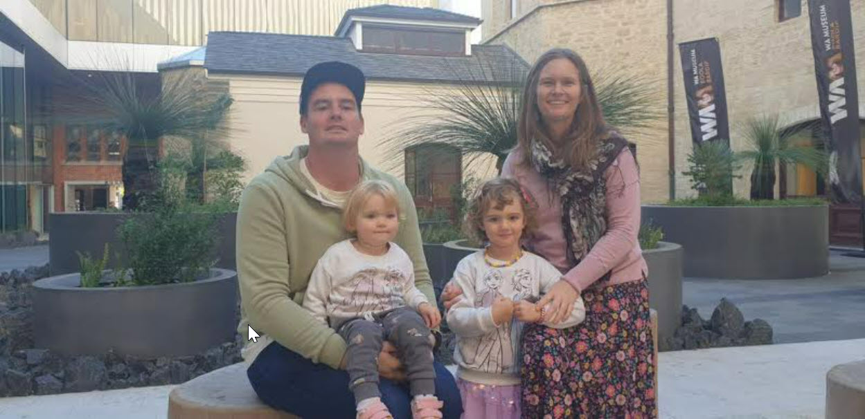 Emma Cochrane with her husband, Dylan, and daughters Clara (left) and Isabel.
