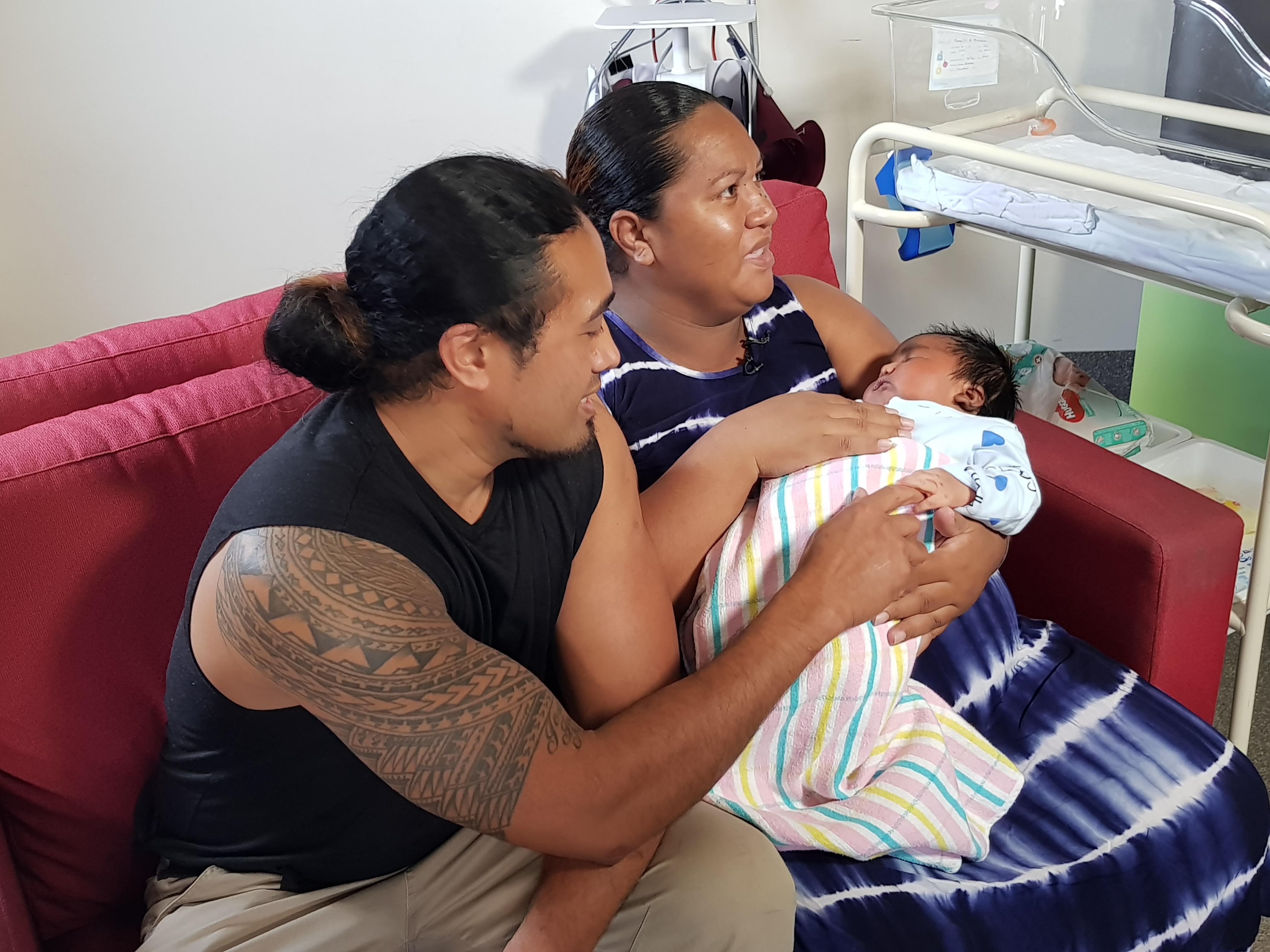 Baby Maoamo with his father and mother, Maoama and Teuaililo Ala.