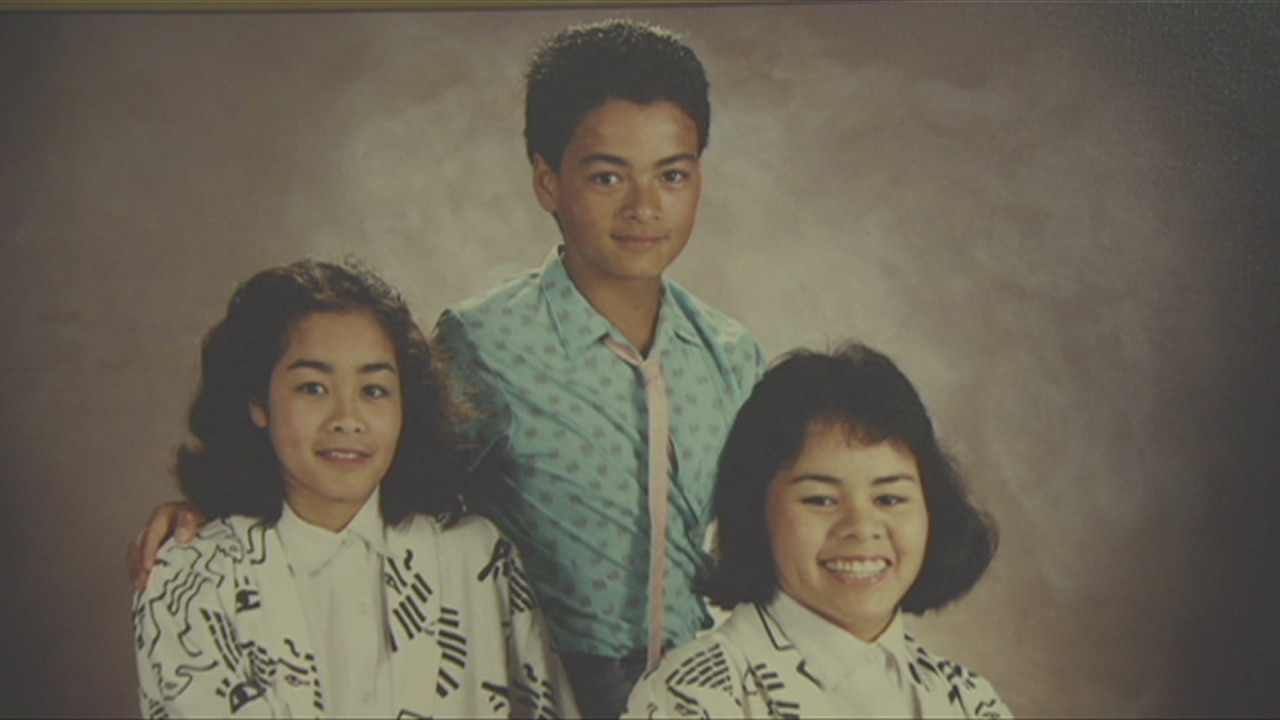 A young Kelvin Kong with his two sisters.  