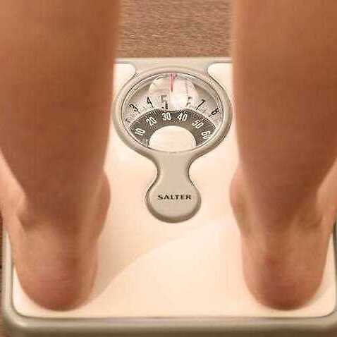 Image of a child on a weighing scale