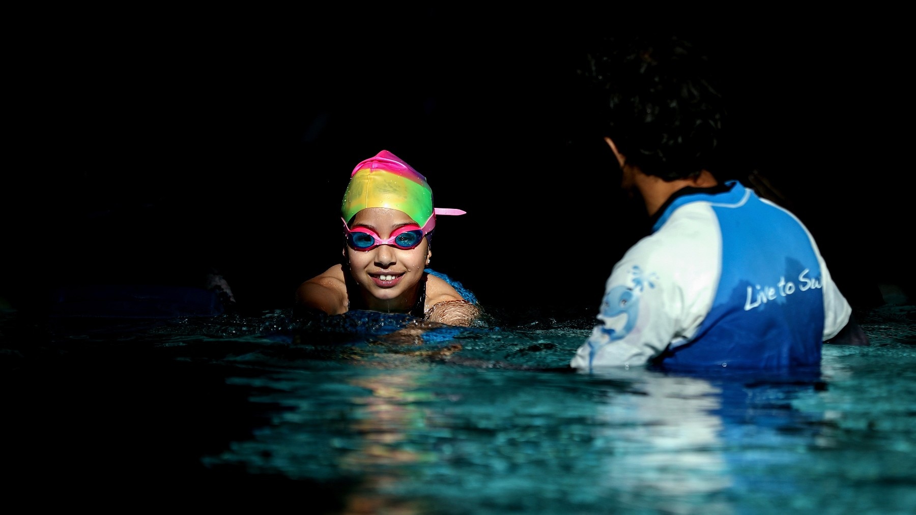 Swimming lesson at the Lane Cove Aquatic Centre in Sydney  