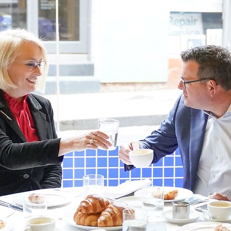 Victorian Premier Daniel Andrews and Melbourne Lord Mayor Sally Capp have breakfast before a press conference in Melbourne, Sunday, November 7, 2021