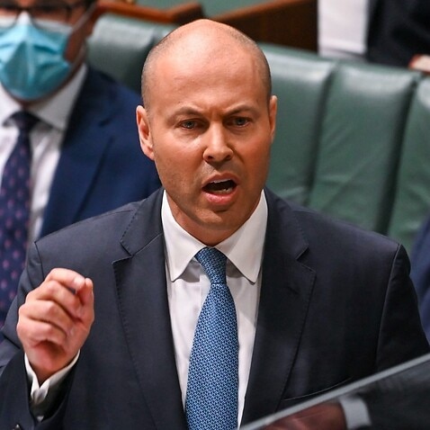 Treasurer Josh Frydenberg delivers the budget in the House of Representatives at Parliament House on March 29, 2022 in Canberra.