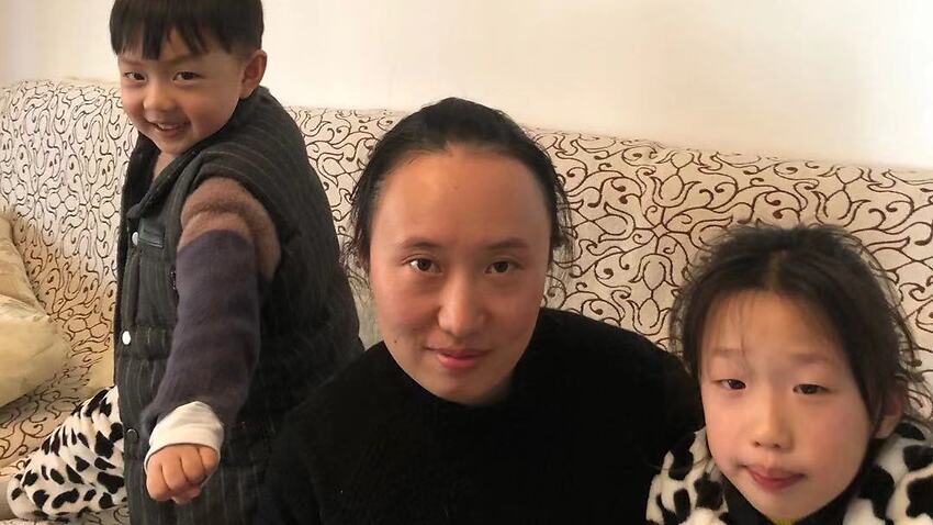 Amy Xia and her two children.