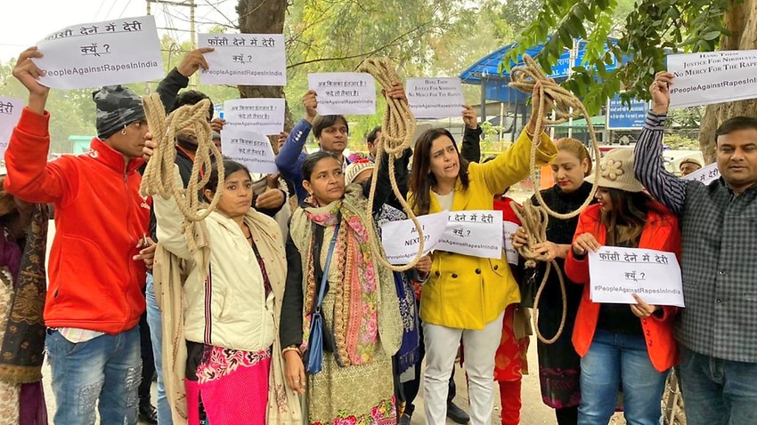 Social worker Yogita Bhayana (centre) and other protesters.