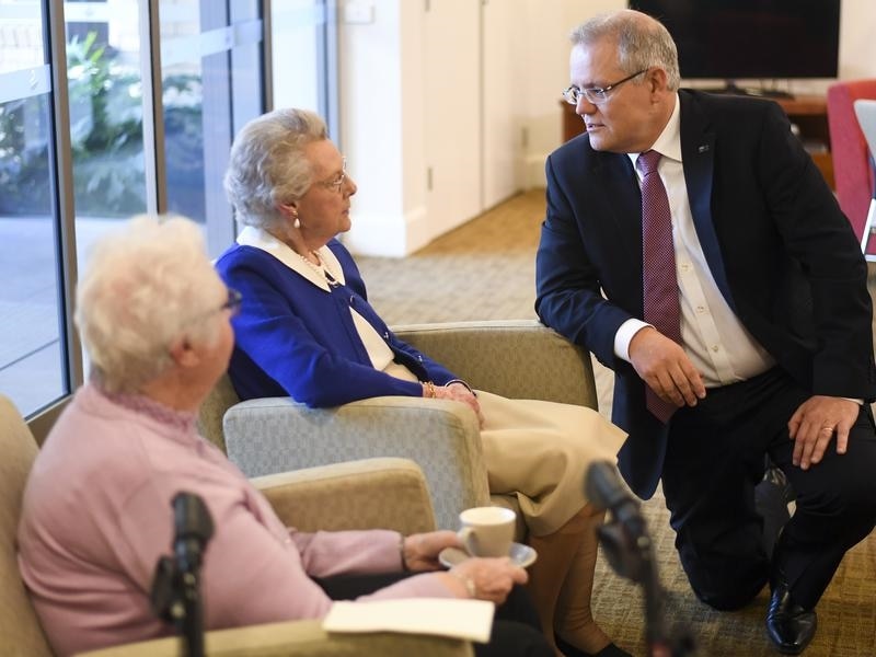 Prime Minister Scott Morrison speaks to aged care residents