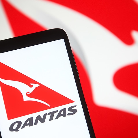 In this photo illustration a Qantas (Qantas Airways Limited) logo of an Australian airline is seen on a smartphone screen. (Photo by Pavlo Gonchar / SOPA Images/Sipa USA)