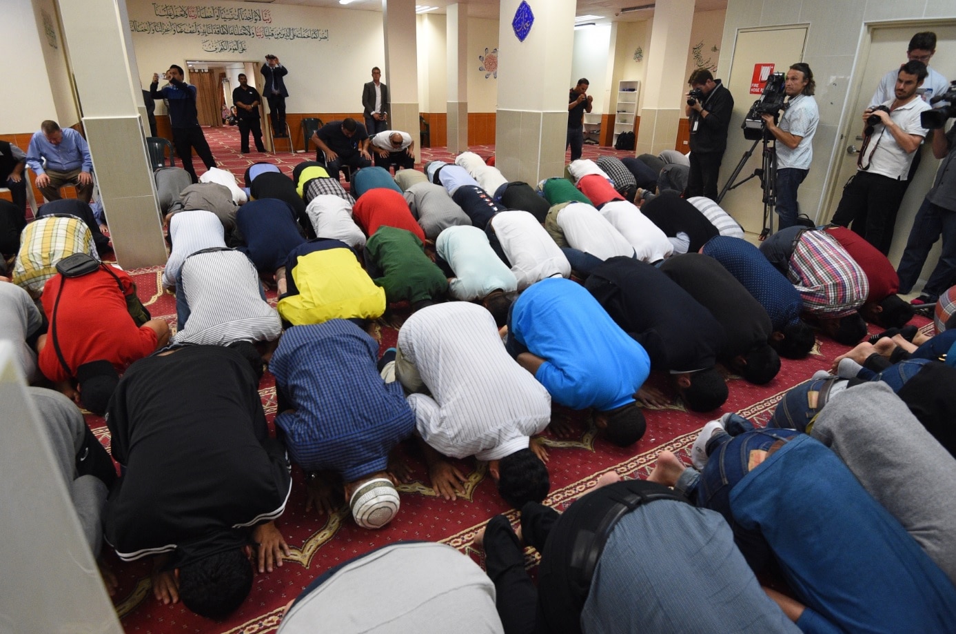 Worshippers pray at Paramatta Mosque during a Friday prayer meeting, Friday, Oct. 9, 2015. 