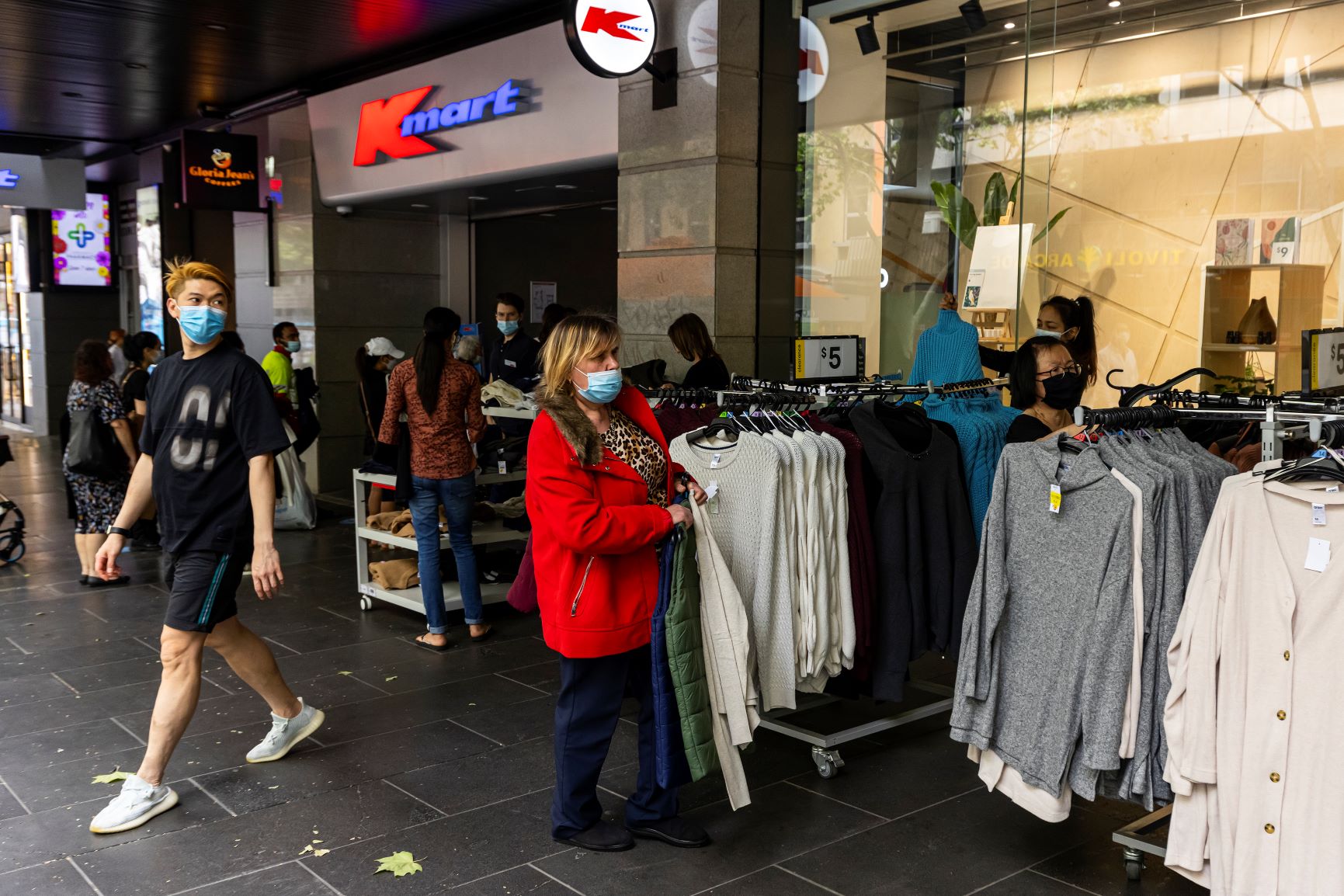 People are seen shopping outdoors at KMart on Bourke Street in Melbourne, Friday, October 22, 2021