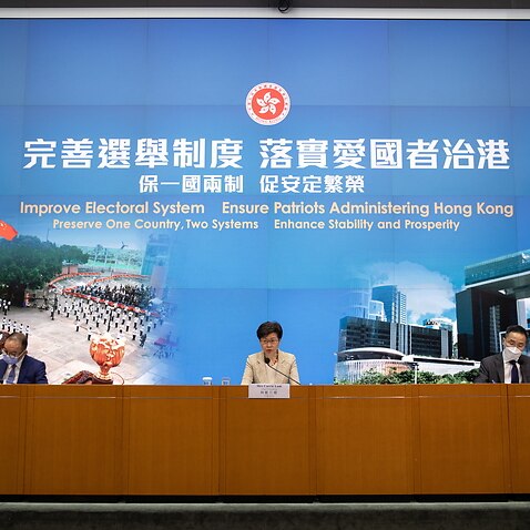 ong Kong Chief Executive Carrie Lam (C) speaks during a press conference about electoral system overhaul in Hong Kong, China, 30 March 2021. China's Standing Committee of the National People's Congress (NPCSC) has approved major changes to the city's elec