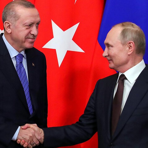 Turkey's President Recep Tayyip Erdogan (L) and Russia's President Vladimir Putin