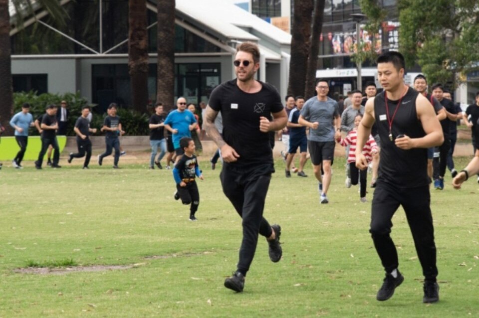 Andrew Xiang (first from right) in an activity to raise money for bushfire relief 