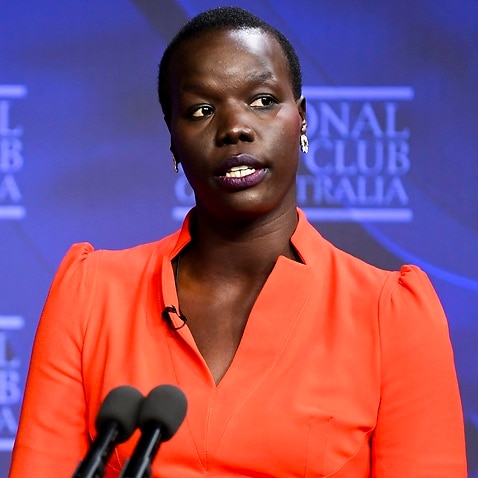 Chair of the Harmony Alliance Nyadol Nyuon delivers her speech at the National Press Club in Canberra, Wednesday, June 30, 2021. (AAP Image/Lukas Coch) NO ARCHIVING