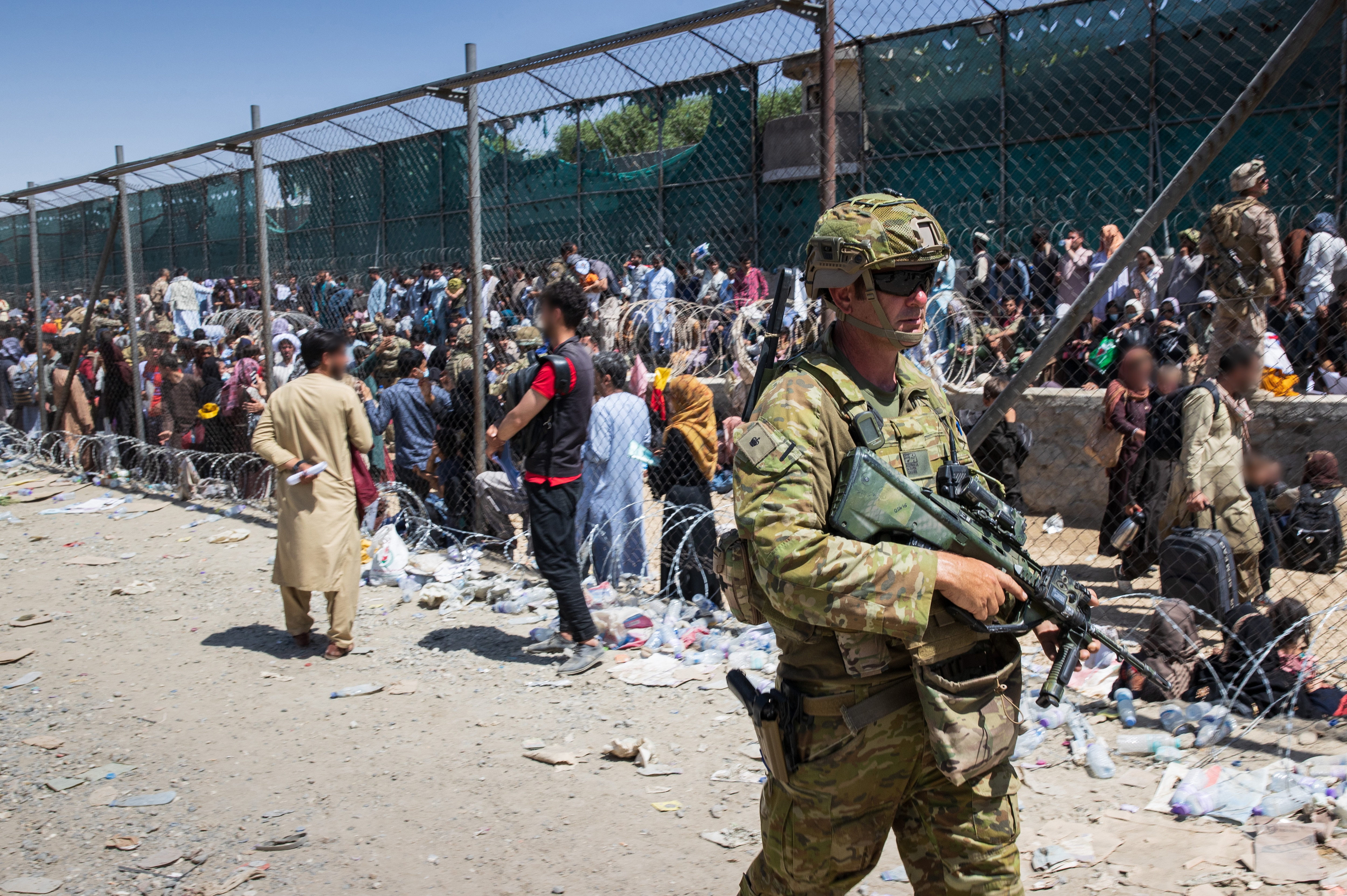 ready combat team assisting the Department of Foreign Affairs and Trade with locating Afghan Australian visa holders attempting to enter the congested Abbey Gate at Hamid Karzai International Airport in Kabul, Afghanistan, Friday, August 27, 2021. (AAP Im