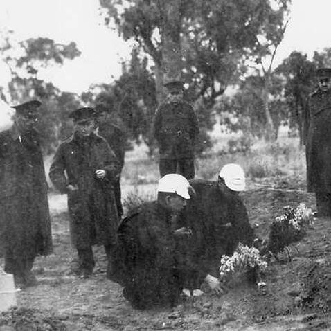 A supplied image obtained on Thursday, August 1, 2019, The burial of Japanese Prisoners of War who lost their lives in the mass breakout from the camp in Cowra. (AAP Image/Supplied, Australian War Memorial) NO ARCHIVING