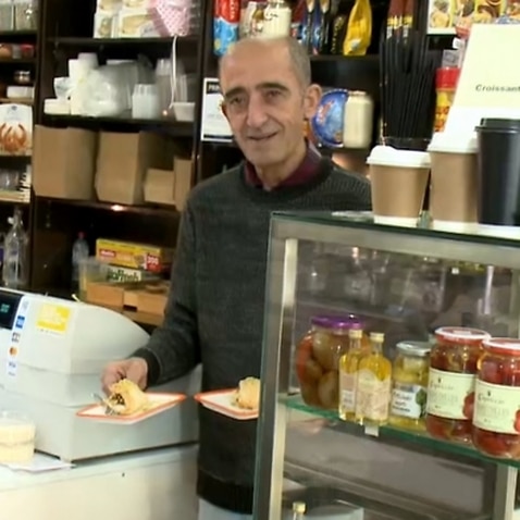 Akram Abu Hamdan in his store in Lygon Street, Melbourne (SBS)