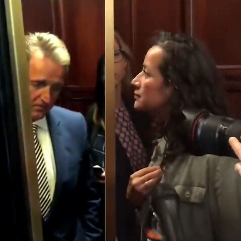 The women on the right confronted Republican Jeff Flake in an elevator.
