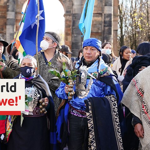Indigenous leaders from around the world march through Glasgow to COP26