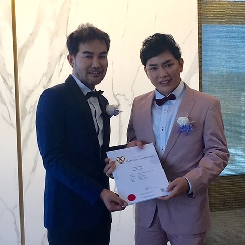 Jarrukit Somjich and Kitticha Srijad, a same-sex couple of Thai background in Queensland.