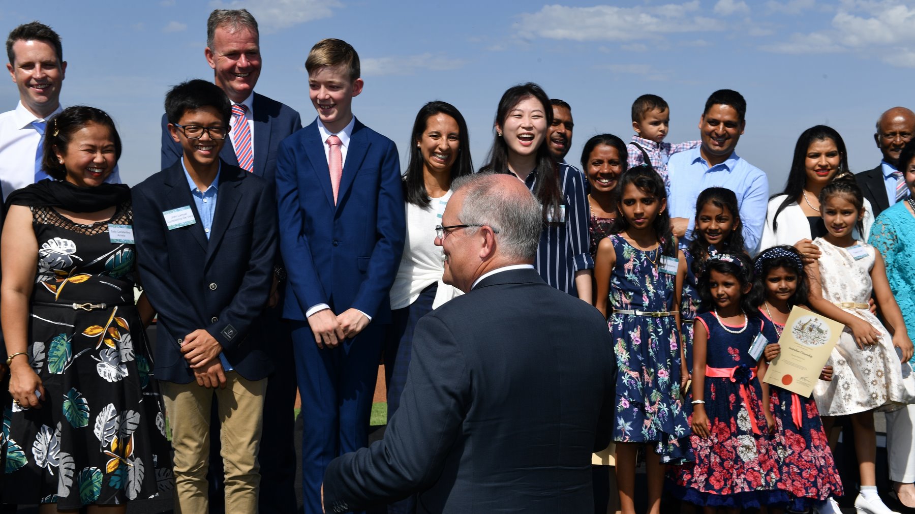 Prime Minister Scott Morrison with newly sworn citizens at an Australia Day Citizenship Ceremony and Flag Raising event in Canberra, Saturday, January 26, 2019. (AAP Image/Mick Tsikas) NO ARCHIVING