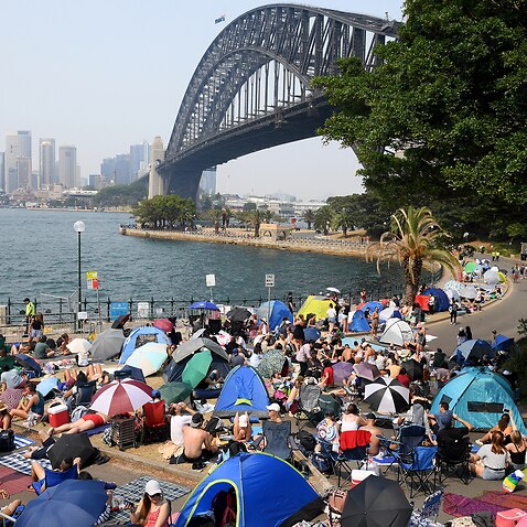 Revellers at Kirribilli, ahead of the New Year's Eve fireworks, in Sydney
