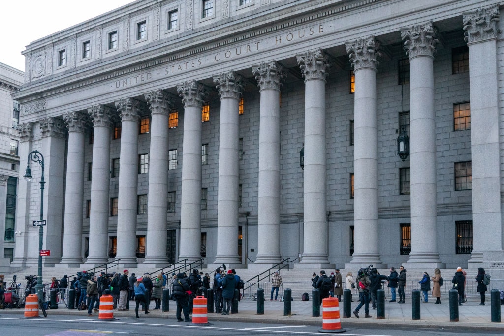 Media gather outside the Thurgood Marshall United States Courthouse in New York, where Ghislaine Maxwell is on trial for sex trafficking.