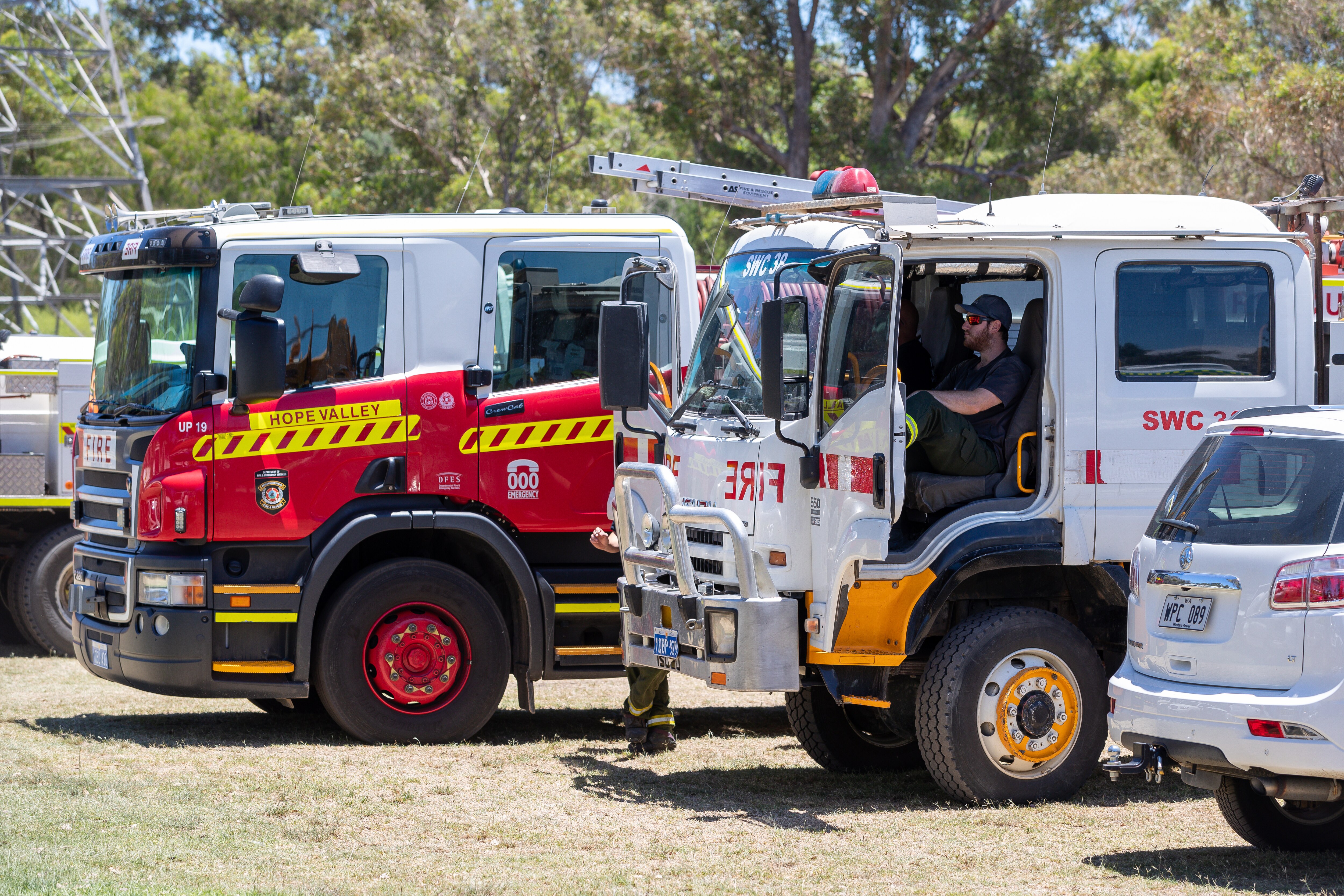 Emergency crews are seen at a control point at Mandogalup Volunteer Bush Fire Brigade, Kwinana, south of Perth.