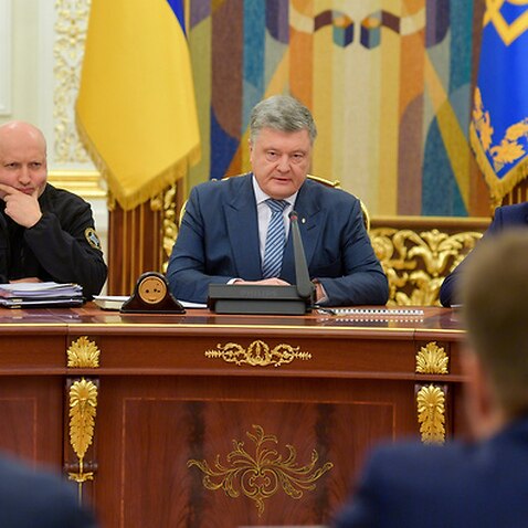 Ukrainian President Petro Poroshenko (centre) leading a meeting of Ukraine's National Security and Defence Council 