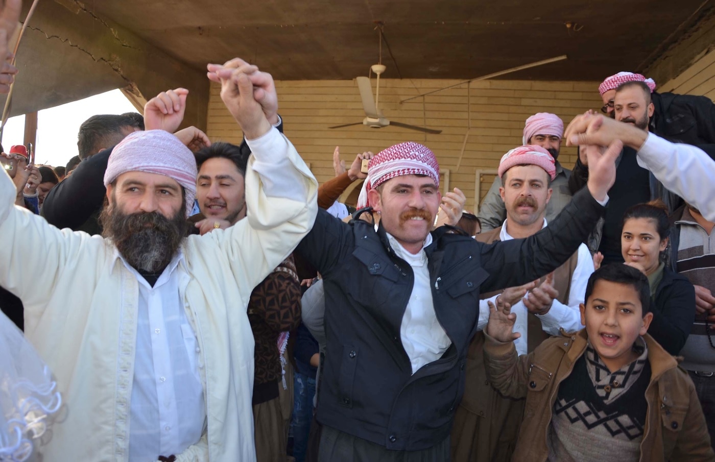 Iraqi Yazidis visit their temple during a ceremony on January 12, 2018, in the town of Bashiqa, some 20 kilometres north east of Mosul (Getty) Iraqi Yazidis visit their temple during a ceremony on January 12, 2018, in the town of Bashiqa, some 20 kilometres north east of Mosul (Getty)