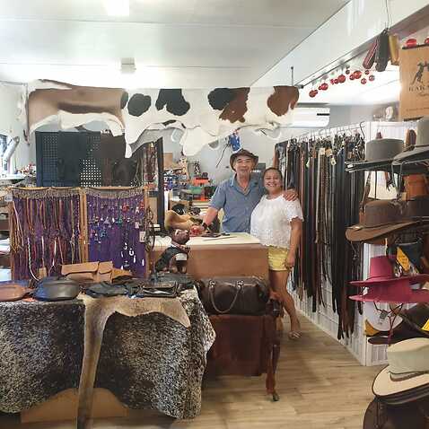 Lorena Granados and husband Gaspar Roman, at their leather store.