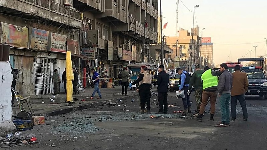 Scenec of a twin bombing in Baghdad, Iraq.