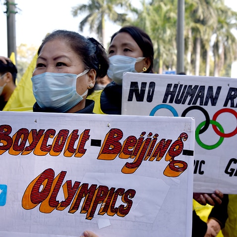 Activists of the Tibetan Youth Congress protest in New Delhi, India against the Winter Olympics in Beijing calling it 