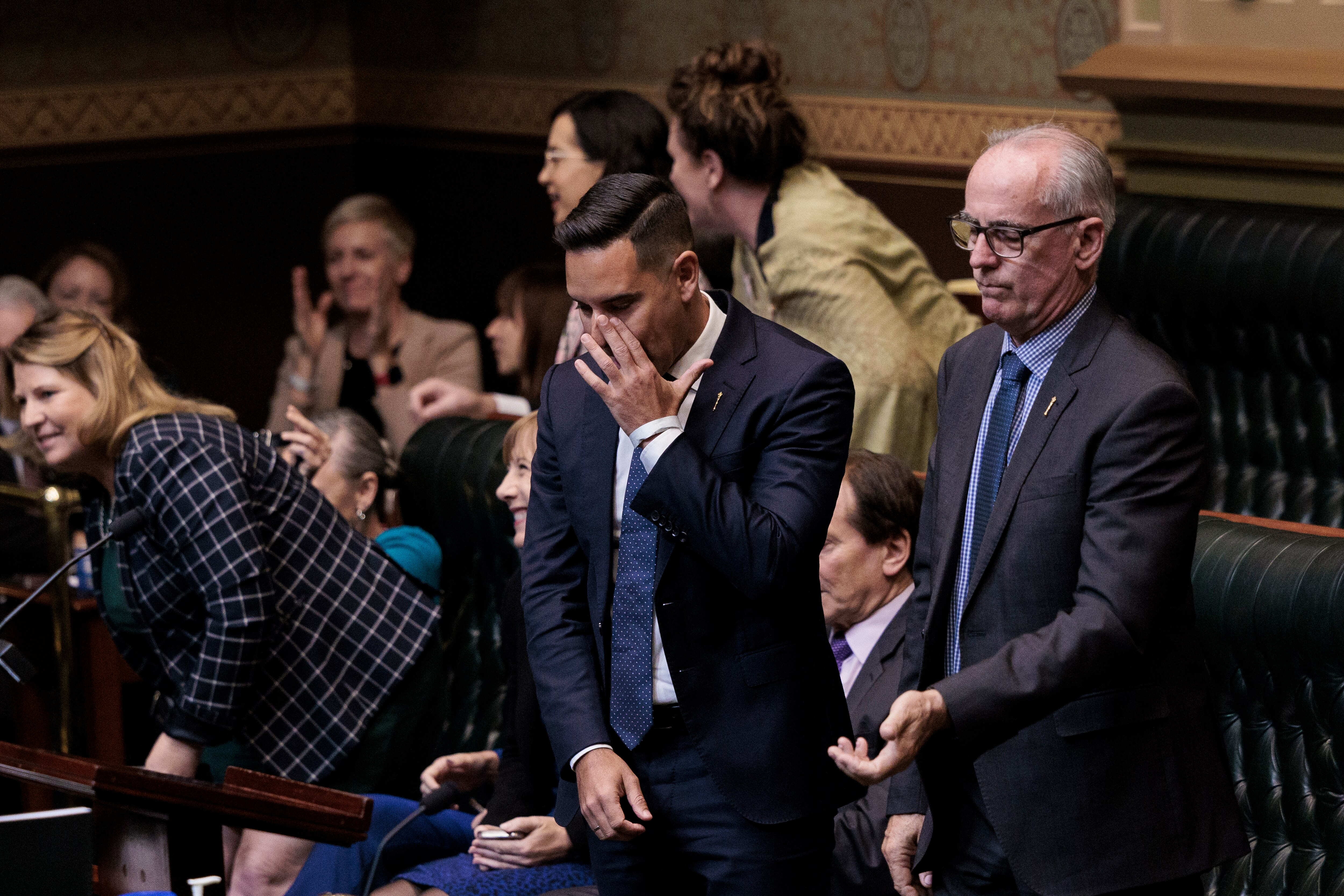 NSW Member for Sydney Alex Greenwich reacts as the Voluntary Assisted Dying Bill passes the Lower House of New South Wales Parliament in Sydney, Thursday, May 19, 2022. 