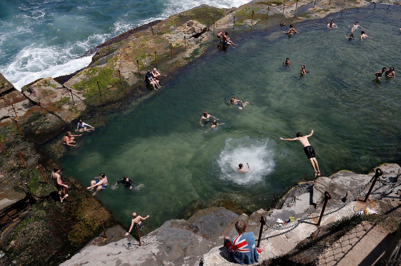 People dive into the Bogey Hole in Newcastle. People dive into the Bogey Hole in Newcastle.