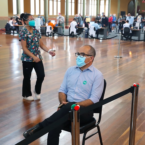Acting Victorian Premier James Merlino receives a Covid-19 booster vaccination at the Royal Exhibition Building in Melbourne, Thursday, December 23, 2021. (AAP Image/Pool, David Crosling) NO ARCHIVING
