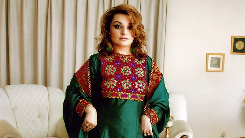 Image for read more article 'Afghan women are sharing photos of colourful clothing in protest of the Taliban'