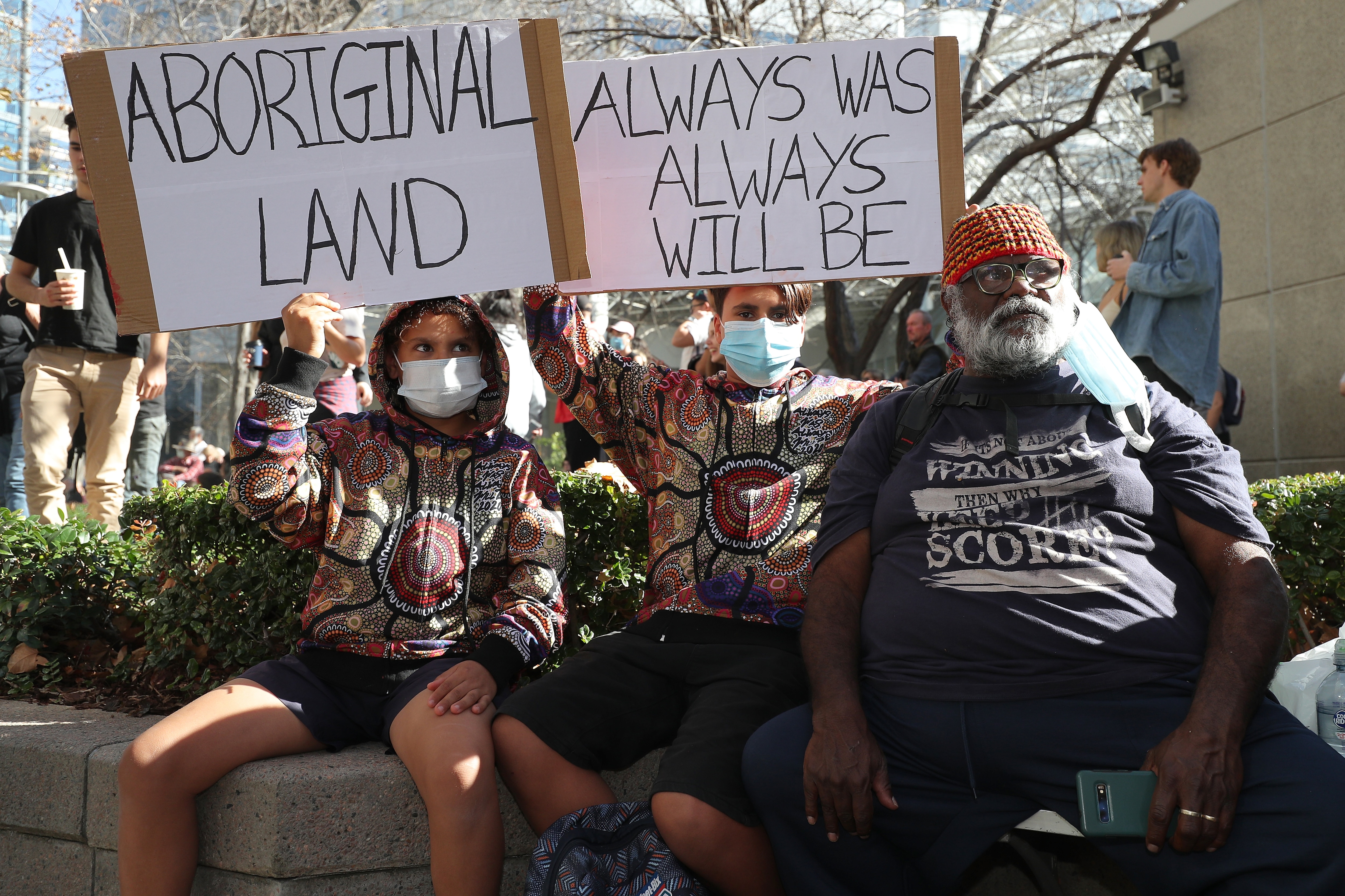 Protesters during a rally outside the Rio Tinto office in Perth, June 2020.