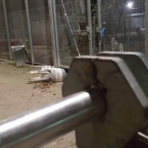 A supplied image obtained Saturday, April 15, 2017 of the damaged outer gate to the Oscar Compound on Manus Island detention centre. 