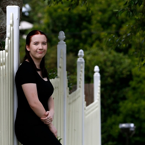 Minnie Knight,19, poses for a photograph, in Charlestown NSW, Friday, 11 February 2022. 