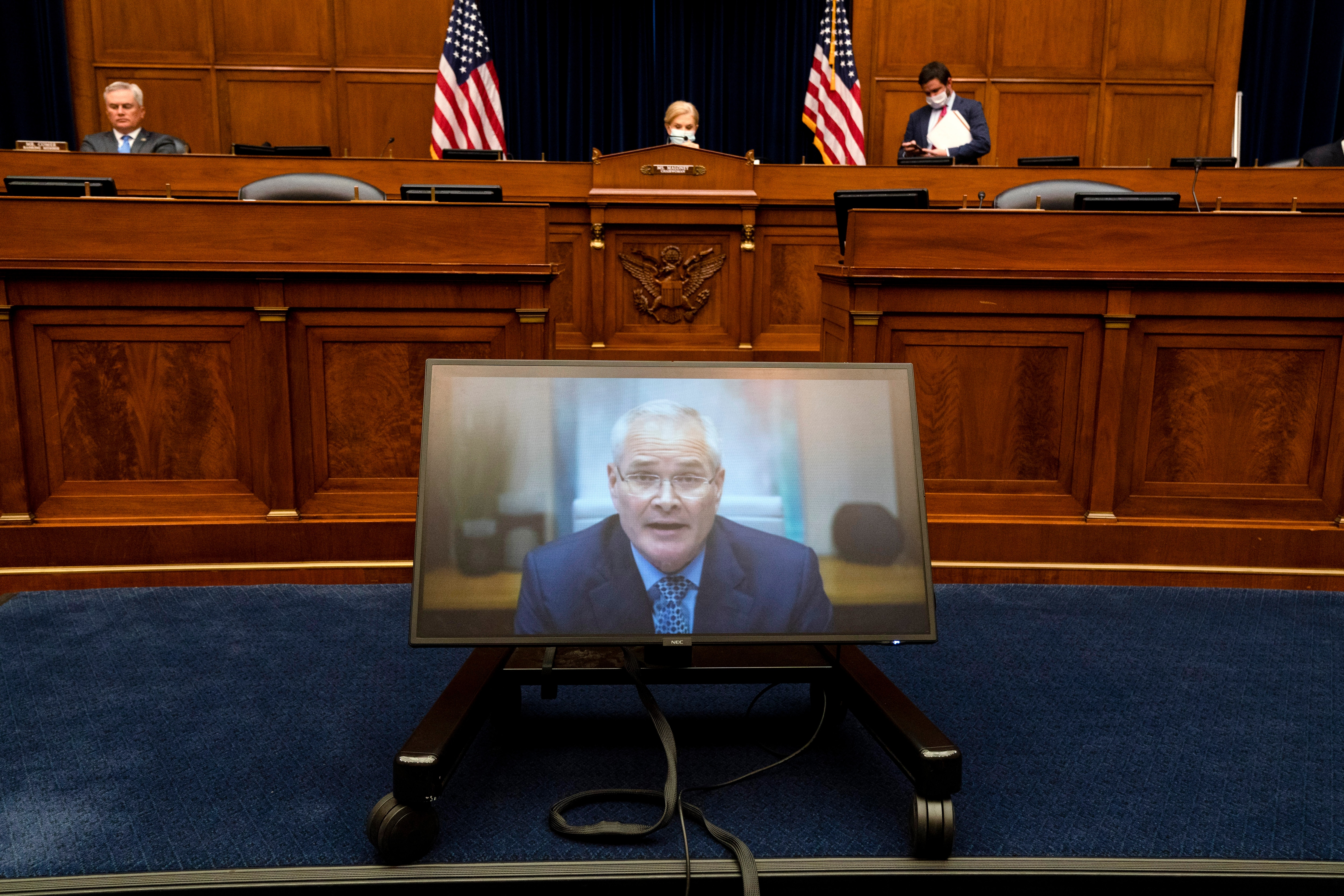 Darren Woods, CEO of ExxonMobil, testifies via video conference 