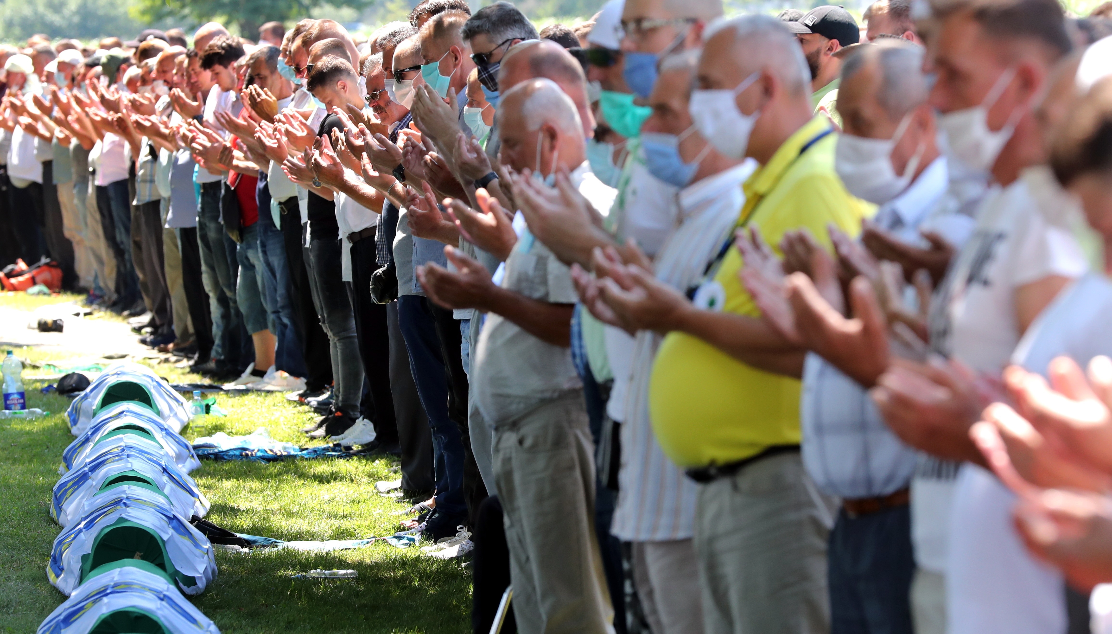 Nine bodies identified and laid to rest 25 years after ...