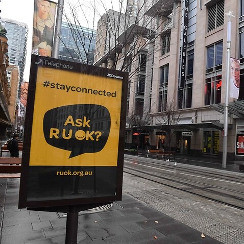 A RUOK sign on George Street is seen in the central business district in Sydney