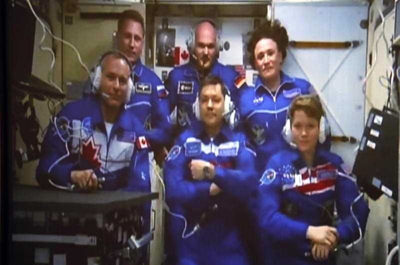 The crews of Exhibitions 58 and 57 aboard the International Space Station.