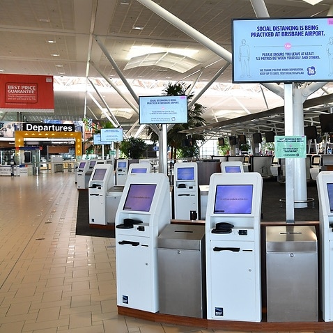 Empty check-in counters at Brisbane International Airport