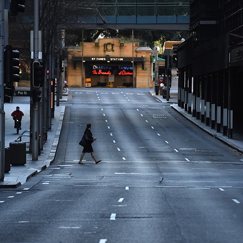 A near empty Market Street is seen in the central business district in Sydney, Thursday, July 29, 2021. NSW recorded 236 new locally acquired cases of COVID-19 in the 24 hours to 8pm last night. (AAP Image/Mick Tsikas) NO ARCHIVING 