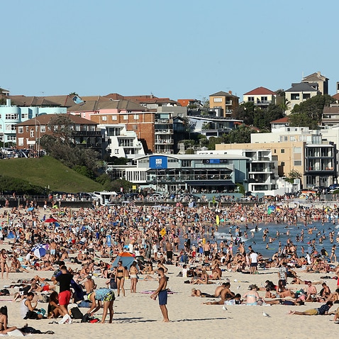 Beachgoers visit Bondi Beach despite the threat of Covid-19 Coronavirus on Friday, 20 March 2020.  
