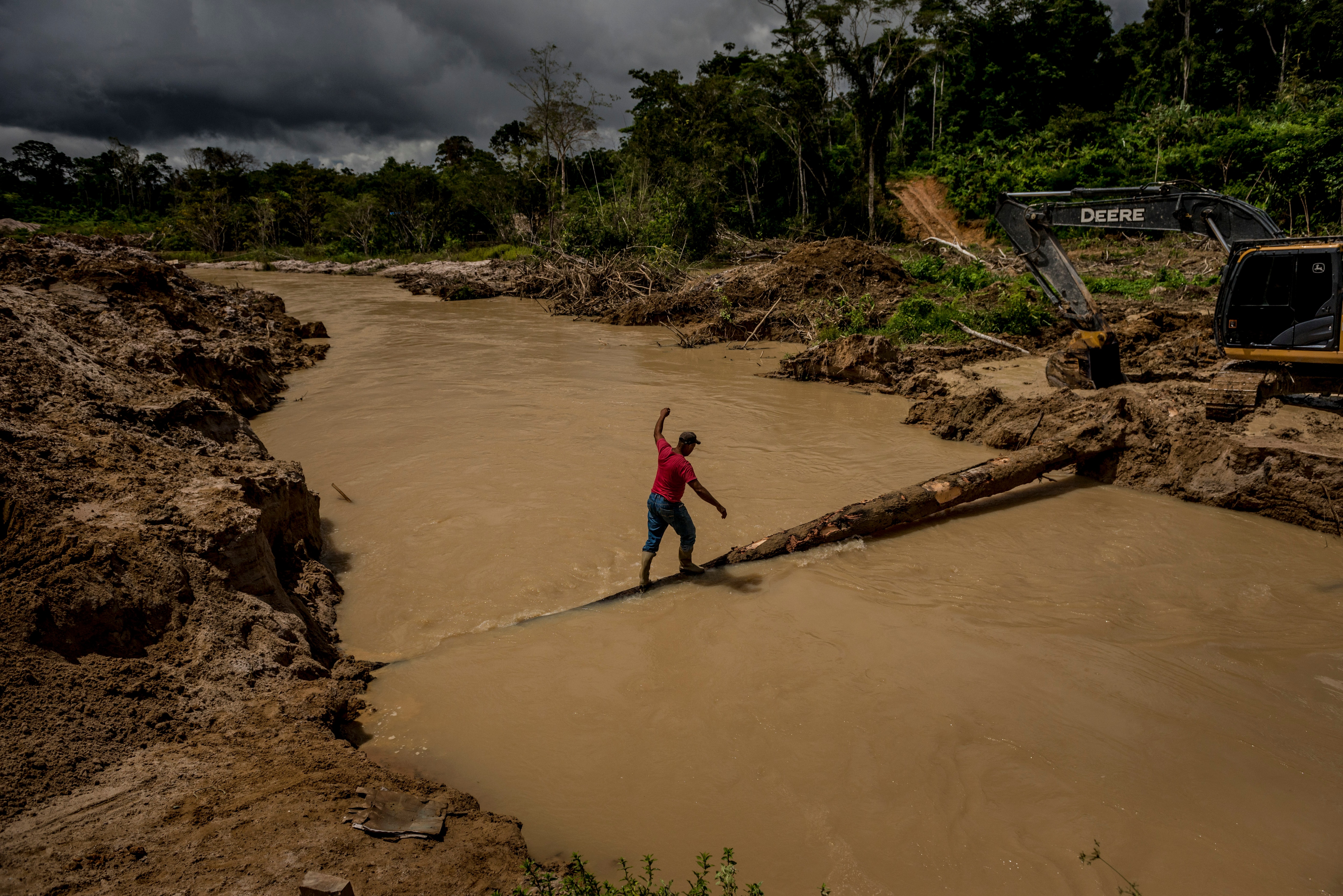 Illegal miners at a gold mine built around Posto de Vigilncia, or Lookout Point, one of the Munduruku tribes most remote villages in the Amazon rainforest. Illegal miners at a gold mine built around Posto de Vigilncia, or Lookout Point, one of the Munduruku tribes most remote villages in the Amazon rainforest in Brazil.