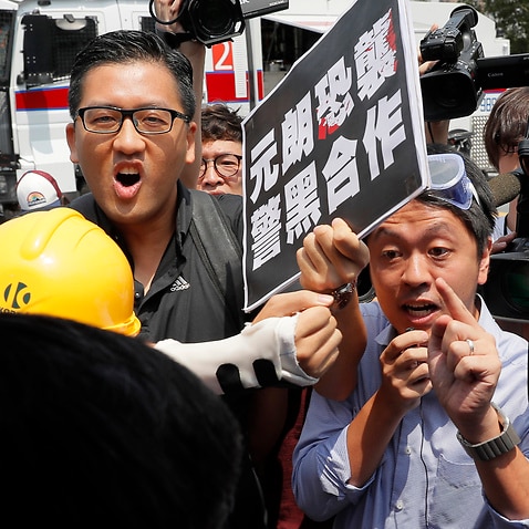 Opposition Hong Kong lawmaker Ted Hui (right) with fellow pro-democracy lawmaker Lam Cheuk-ting in 2019. 